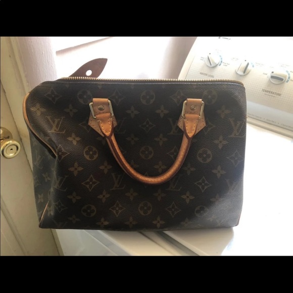 Louise Vuitton. Fair condition still look great - Picture 3 of 10